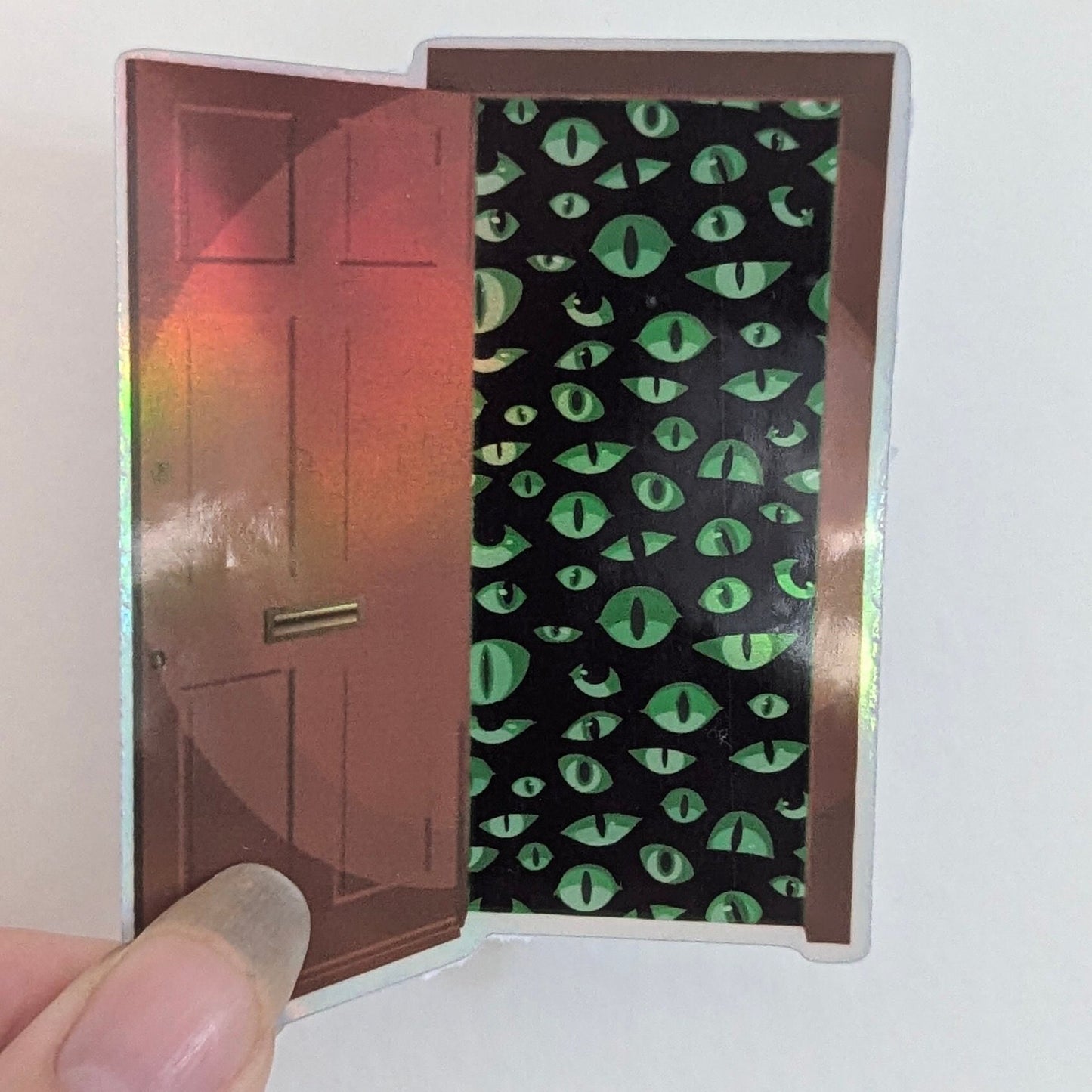 Spooky eyes in the Doorway green | vinyl sticker | waterproof